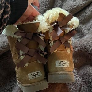 UGG Tan Boots with Cream Shearling and Brown Ribbons